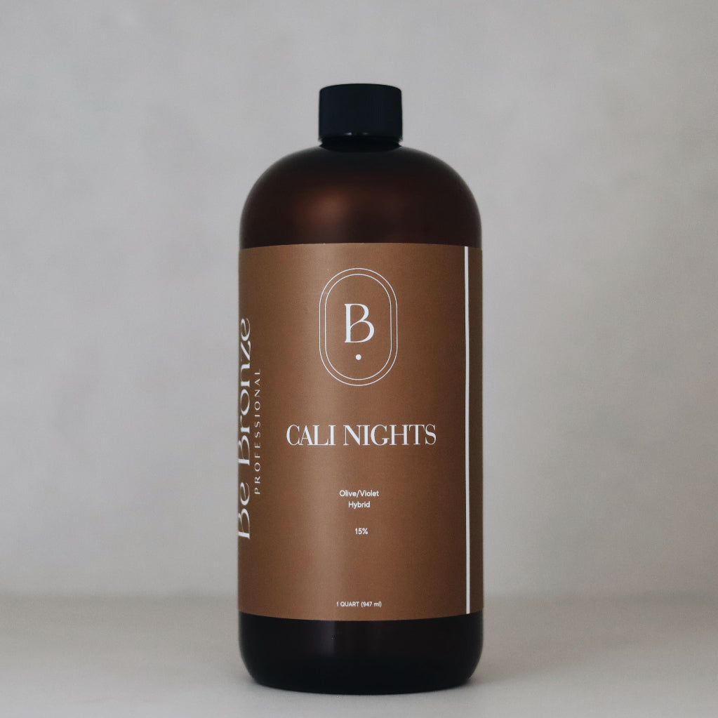 Brown bottle labeled 'Cali Nights' with a black cap on a light gray background. Pro Solution Self Tanner